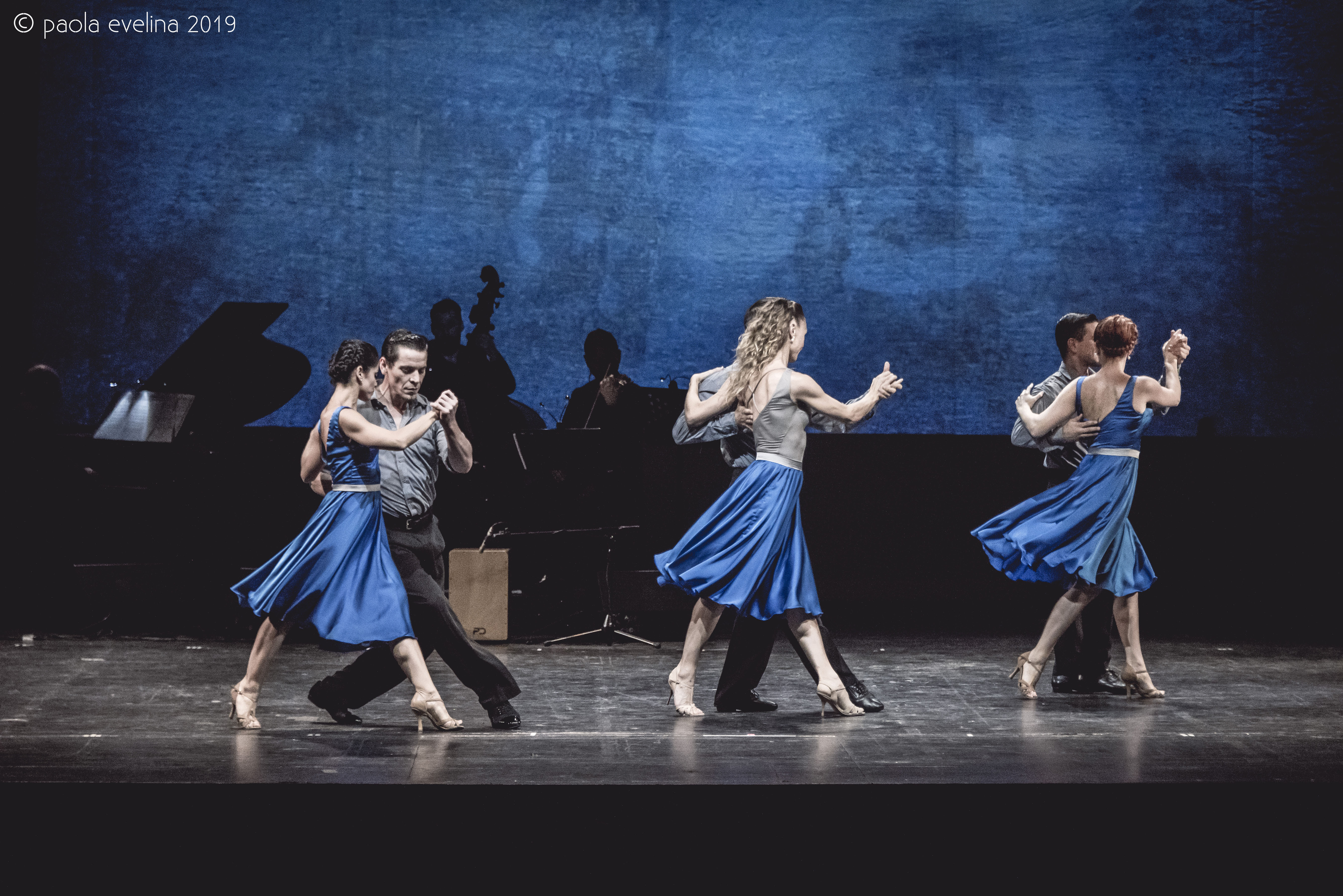 Three couples of Tango dancers