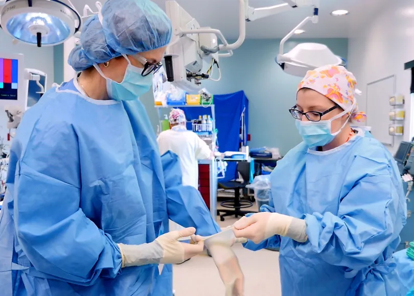 Two people in scrubs.