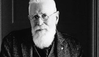 A black and white image of Bruce Cockburn.