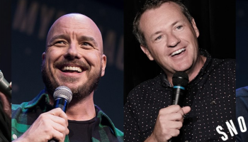 A photo of 4 stand up comedians each with a mic in hand.