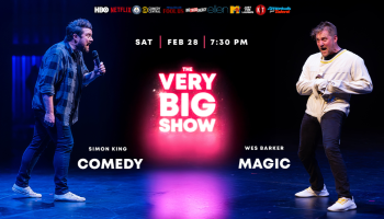 Wes Barker and Simon King on stage mid performance. The words, 'The Vey Big Show' in bright pink lettering between them. Event date Sat, Feb 28 at 7:30pm