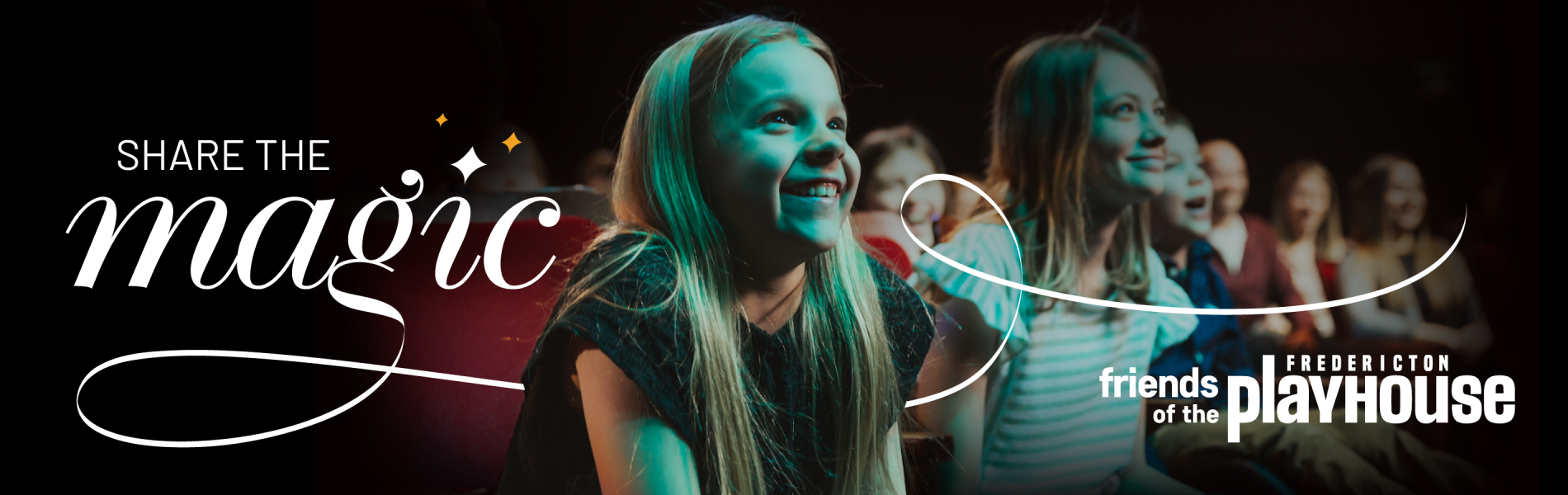 two young children smiling in an audience, words overlaid "share the magic"