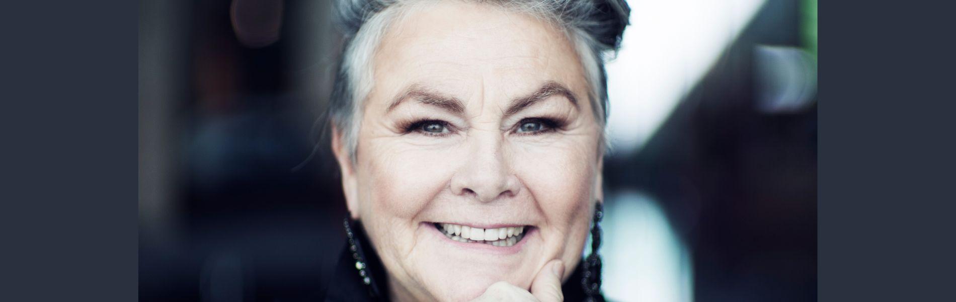 A closely cropped headshot of Mary Walsh