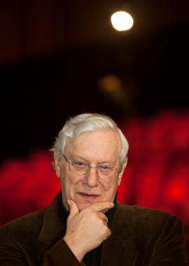 Headshot of Walter Learning in an empty theatre